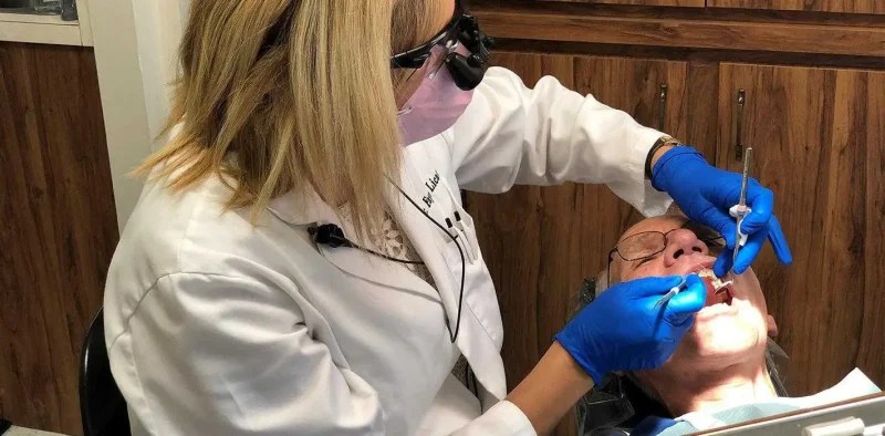 Dr. Licata and patient during dental check up